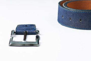Broken blue pants belt isolated on white background.Copy space