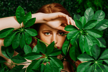 girl with green leaves