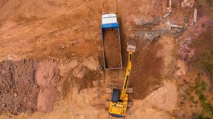 Aerial view excavator working on a construction site.