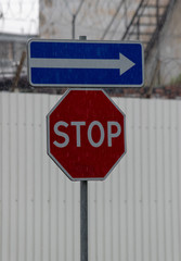 Road sign on city background