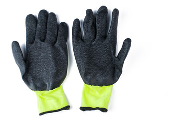 Green gloves isolated on white background.Copy space