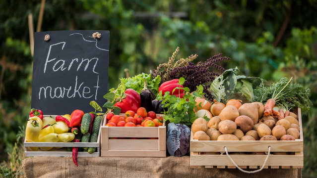 A Counter With Fresh Vegetables At A Farmers Market. Vegetables From Local Producers