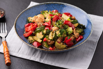 Vegetable stire fried on blue plate