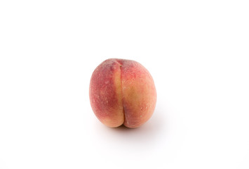 Fresh yellow peach isolated on white