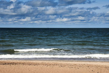 Fototapeta na wymiar Cloudy day by Baltic sea.
