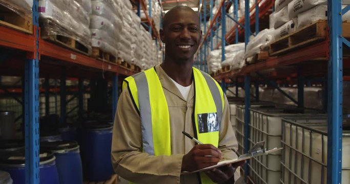 Portrait of young male warehouse worker 4k