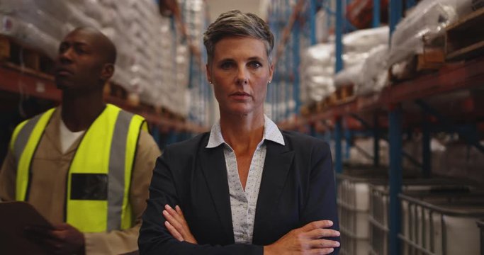 Portrait of female manager in a warehouse 4k
