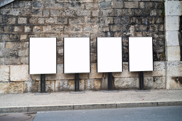 advertising poster wall on urban street