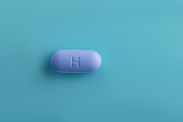 Open bottle of prescription PrEP Pills for Pre-Exposure Prophylaxis to help protect people from HIV.