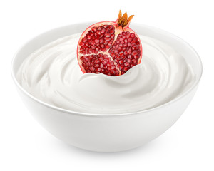 pomegranate with sour cream, yogurt, isolated on white background, clipping path, full depth of field