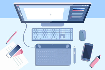 Workplace graphic designer, digital artist or freelancer with a computer monitor, graphics tablet, phone, pencil, paper and color catalog. Digital Art desk Concept.