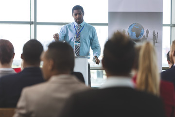 Male speaker speaks in a business seminar