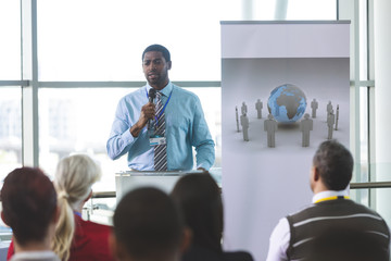 Male speaker speaks in a business seminar