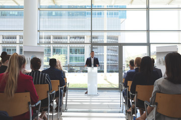 Male speaker speaks in a business seminar
