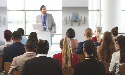 Group of business people attending a seminar