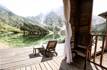 Glamping holidays. A beautiful view of mountains and white and  blue sky in distance. 
