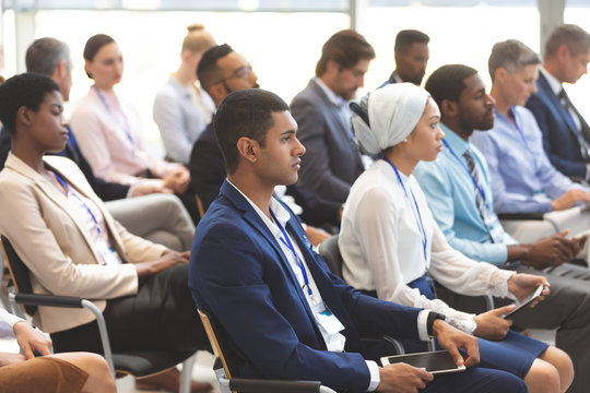 business people attending a business seminar