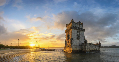 Lisbon Portugal sunrise panorama city skyline at Belem Tower and Tagus River