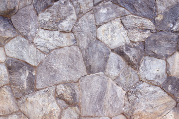 Stone wall as a background or texture.