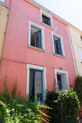Fototapeta na wymiar Trentemoult village in France colorful houses pink salmon and yellow