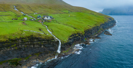 Atlantic ocean sea waves in Bordoy cliffs, Faroe Islands