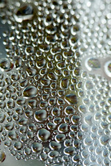 Water drops macro from a plastic bottle fifty megapixels