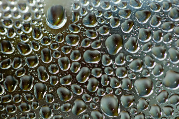 Water drops macro from a plastic bottle fifty megapixels
