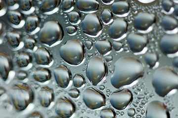 Water drops macro from a plastic bottle fifty megapixels