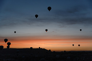 balloons in Cappadocia at dawn