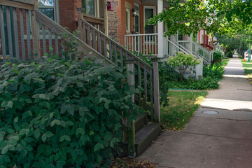 Staircases in front of Old Homes and a Sidewalk in Logan Square Chicago