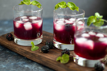 glass of red wine with berries