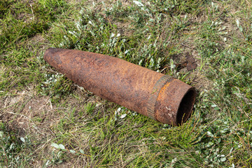 Unexploded bomb in a field.