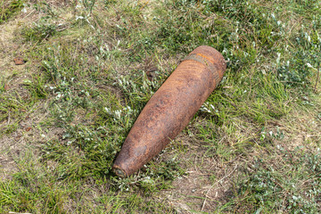 Unexploded bomb in a field.
