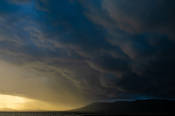 Light in the Dark and Dramatic Storm Clouds background,before the rain