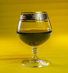 Pouring red wine into the glass. Pour red wine.