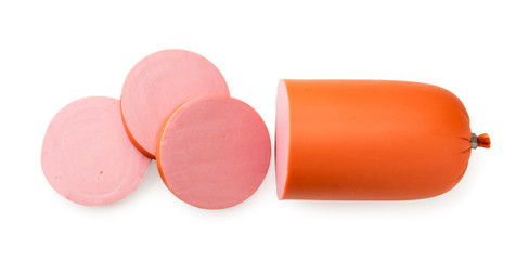 Doctor sausage cut into pieces on a white. The view of the top.