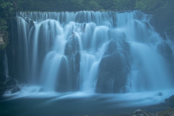 Fototapeta na wymiar Small waterfall in Bohinj region