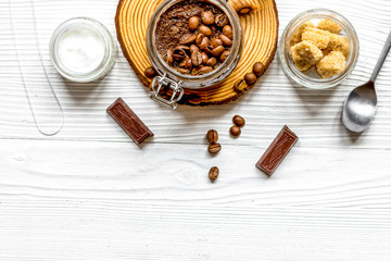 Organic cosmetics based on coffee top view wooden background