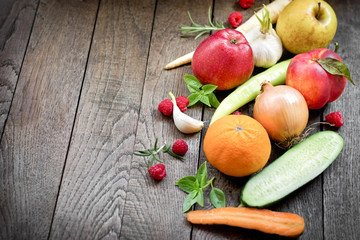 Healthy food - Organic fruit and vegetable on rustic table 