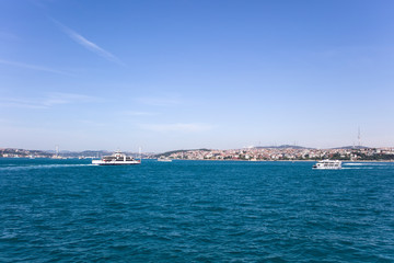 Fototapeta na wymiar Boat at Bosphorus strait in Istanbul, Turkey