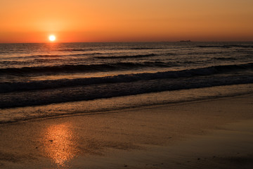 Fototapeta na wymiar Sunset on the beach of La Barrosa, Sancti Petri, Cádiz, Spain
