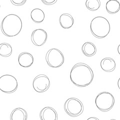 Circle doodles seamless pattern. Hand drawn round shapes texture background.