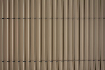 Beige vertical laths texture.