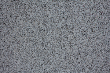 Rough grey concrete surface.