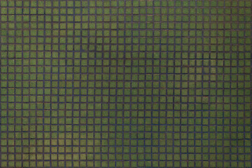 Wall green tiles with little mosaic squares.