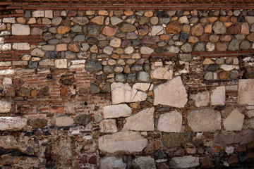 Wall with stone blocks texture.