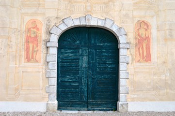 an old Italian building with a colorful facade