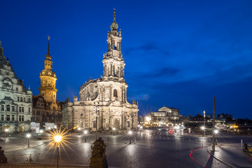 Fototapeta na wymiar Square with Cathedral of the Holy Trinity (Katholische Hofkirche) in Dresden, Germany