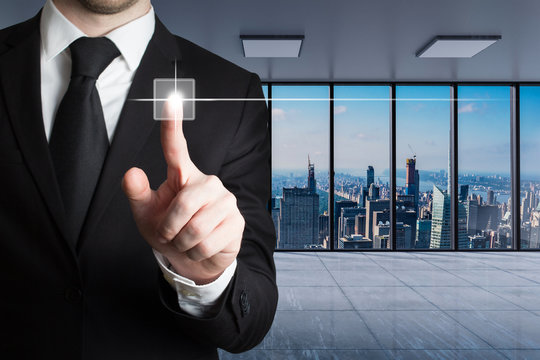 Businessman In Large Modern Office With Skyline View Pushing Virtual Touchscreen Button With Finger, Conceptual 3D Illustration