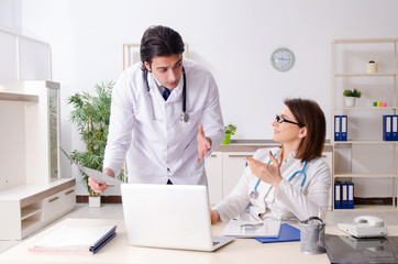 Two doctors working in the clinic
